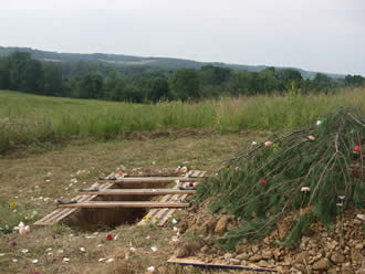 Gravesite at Foxfield Preserve, overlooking a natural meadow. 