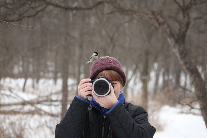 Taking pictures of each other with birds on our heads was such fun! (Photo copyright Janet M. Hug)