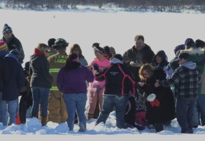 Young girl in pink preparing to take the plunge