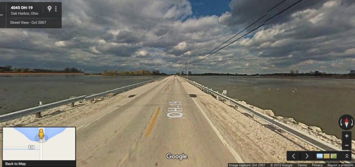 Toussaint River, where the water is close to the road (Image (c) Google Maps