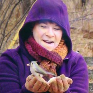 Kim with titmouse in hand at Kensington Dec 2014