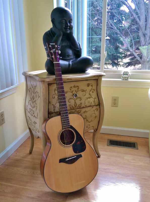 guitar and monk statue in sunroom (594x800)